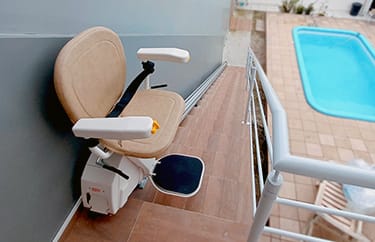 AmeriGlide outdoor chair stairlift on exterior steps